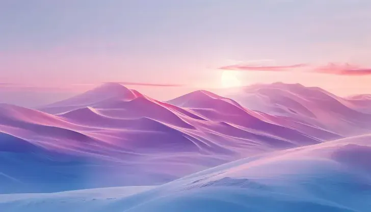 Soft pink mountain ranges at first light
